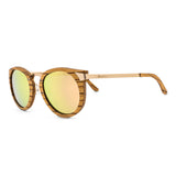 Handcrafted Polaroid Sunglasses made of wood. Round Sunglasses for men and women. Great for blocking the sun with a high fashion accessory.