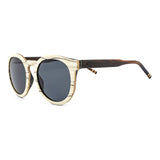 Handcrafted Polaroid Sunglasses made of wood. Sunglasses for men and women. Great for blocking the sun with a high fashion accessory.
