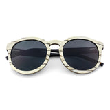 Handcrafted Polaroid Sunglasses made of wood. Sunglasses for men and women. Great for blocking the sun with a high fashion accessory.