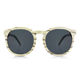 Handcrafted Polaroid Sunglasses made of wood. Sunglasses for men and women. Great for blocking the sun with a high fashion accessory.