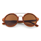Handcrafted Polaroid Sunglasses made of wood. Round Sunglasses for men and women. Great for blocking the sun with a high fashion accessory.