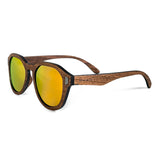 Handcrafted Polaroid Sunglasses made of wood. Sunglasses for men and women. Great for blocking the sun with a high fashion accessory.