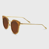 Handcrafted Polaroid Sunglasses made of wood. Sunglasses for  women. Great for blocking the sun with a high fashion accessory.