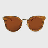 Handcrafted Polaroid Sunglasses made of wood. Sunglasses for  women. Great for blocking the sun with a high fashion accessory.