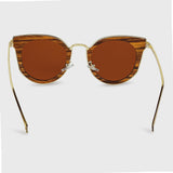 Handcrafted Polaroid Sunglasses made of wood. Sunglasses for  women. Great for blocking the sun with a high fashion accessory.