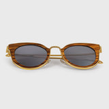 Handcrafted Polaroid Sunglasses made of wood. Sunglasses for  women. Great for blocking the sun with a high fashion accessory.