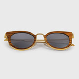 Handcrafted Polaroid Sunglasses made of wood. Sunglasses for  women. Great for blocking the sun with a high fashion accessory. 